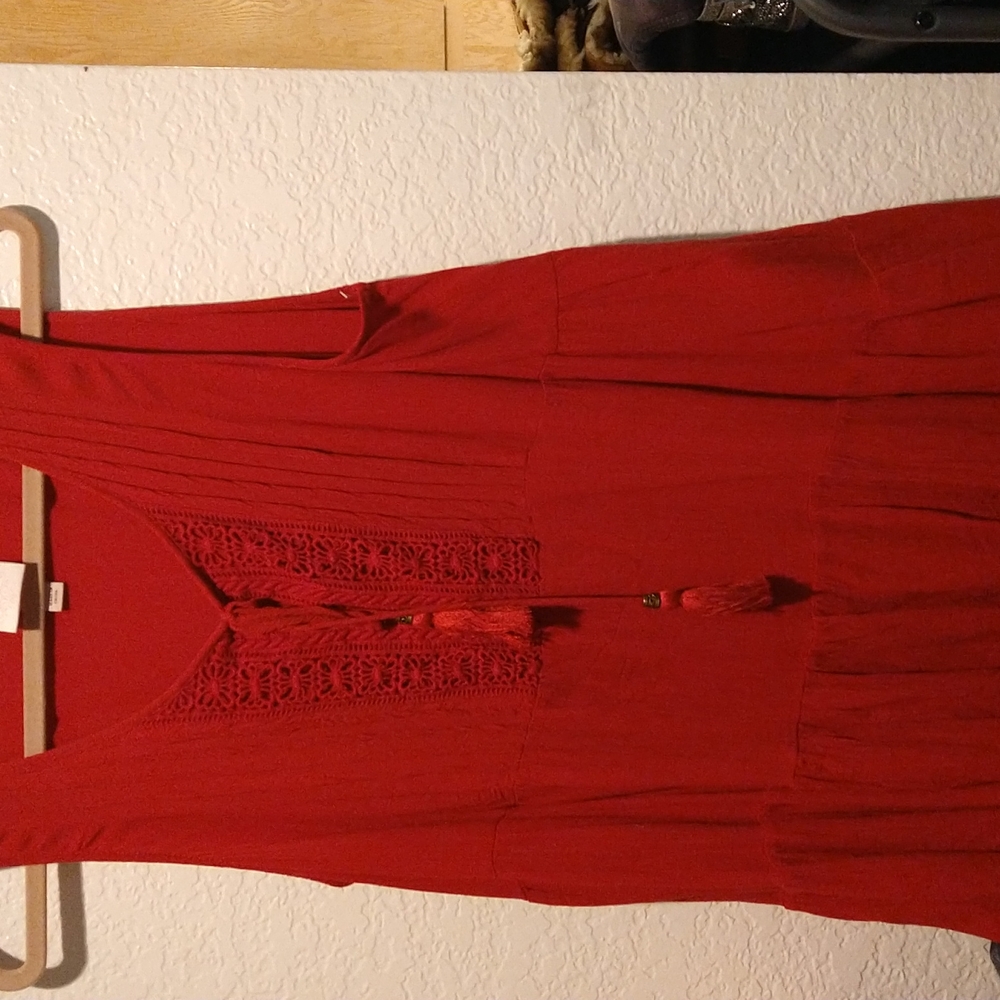 Red sleeveless shirt